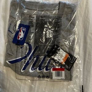 Jordan brand Philadelphia 76ers T shirt.  New with tags, unopened in bag.